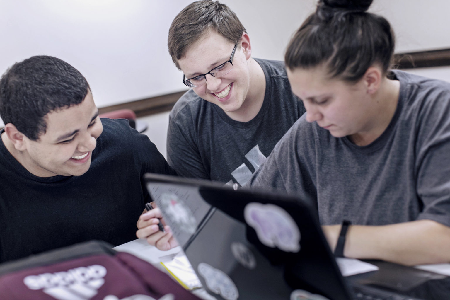 CU Windsor students collaborating in class